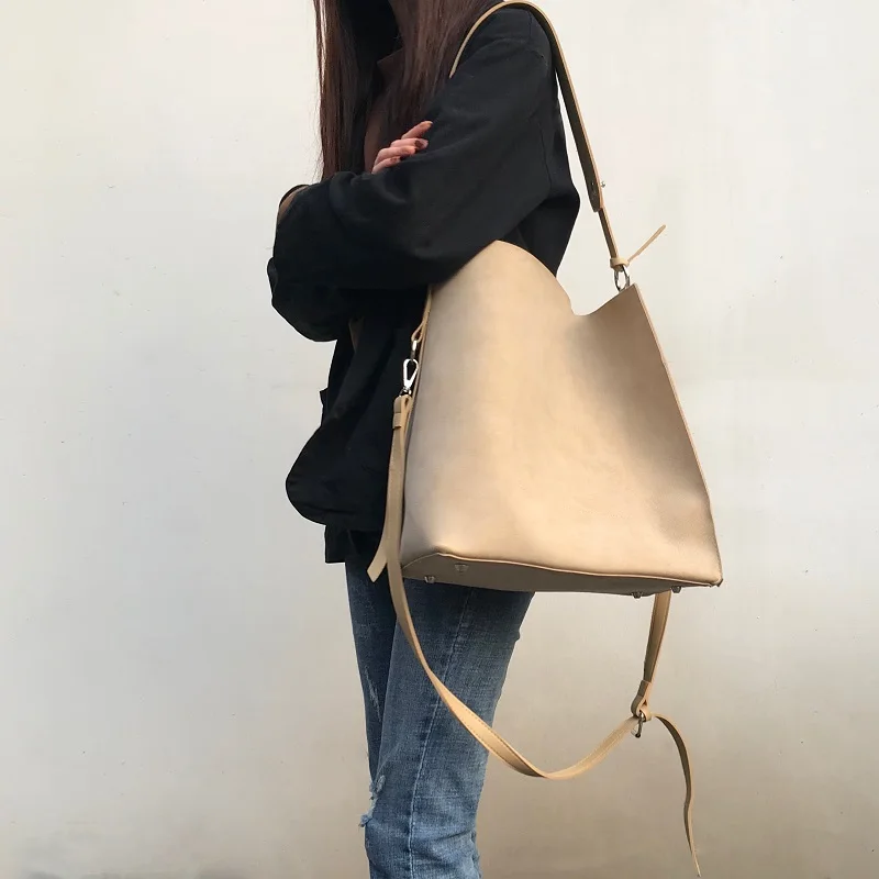 

Spring and summer new retro-ancient large capacity simple shoulder splicing mousse large bag slanting female bun mother bag