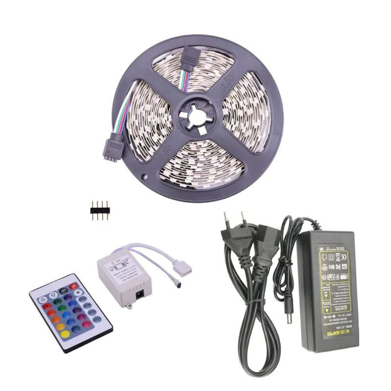 

Tira LED 5M 5050 RGB Strip Light DC 12 V Flexible Rope Band 60leds/m with Adhensive Tape 24 Button IR Remote Control AC Adaptor