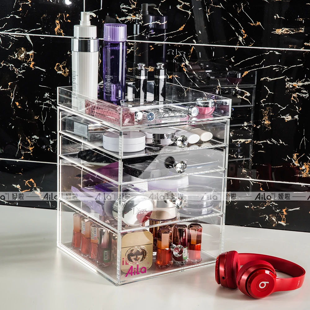 

Aila Clear Acrylic Makeup Organizer Storage Box with 4 Pull Out Drawers 1 Top Tray and Diamond Handles