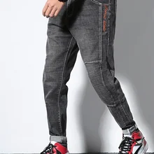 Весенние мужские джинсы мужские эластичные строчки синие трендовые шаровары свободные большие размеры толстые длинные штаны серые