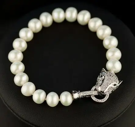 

Free Shipping>>> new leopard head 12-11MM SOUTH SEA white PEARL bracelet