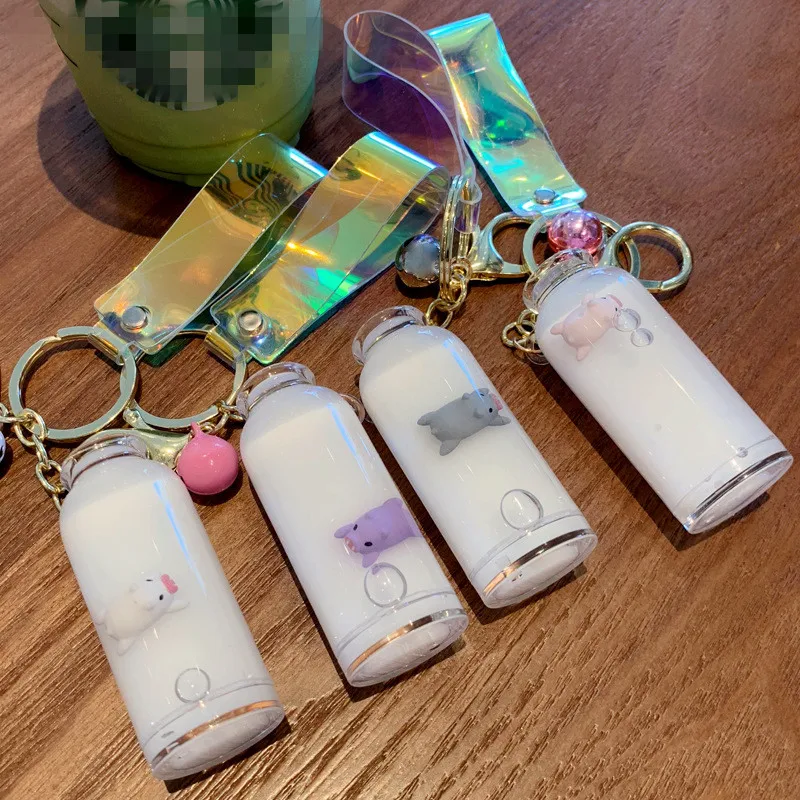 

Floating piglet liquid bottle keychain quicksand drift bottle milk bottle keyring for women bag pendant