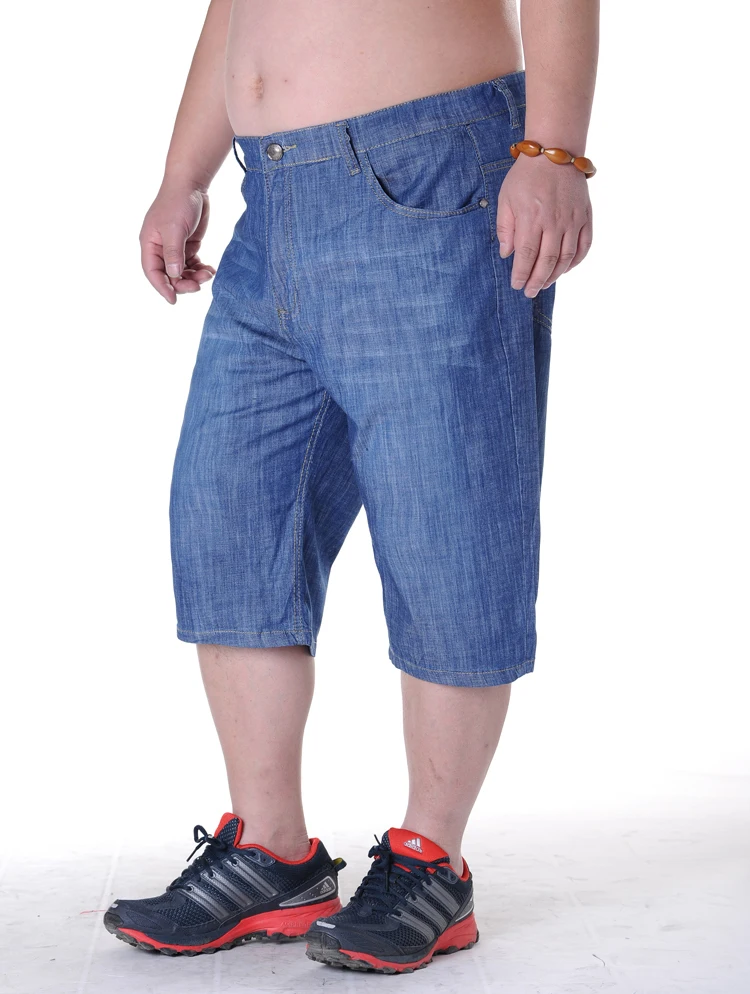 fat guy in jean shorts