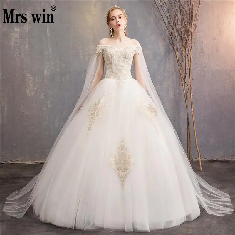 

Champagne Lace Embroidery Wedding Dress 2019 New Mrs Win Sexy Off The Shoulder Wedding Gown With Cape Vestido De Noiva F