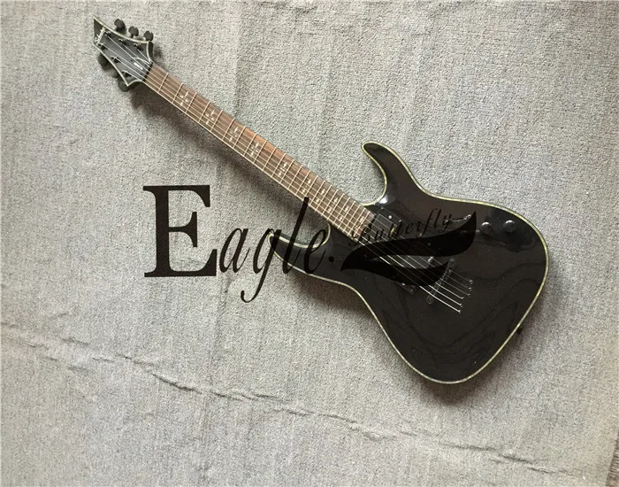 

Eagle. Butterfly custom shop , Scott 24 black enclosed pickup, electric guitar with strings pierced behind the bridge, in stock
