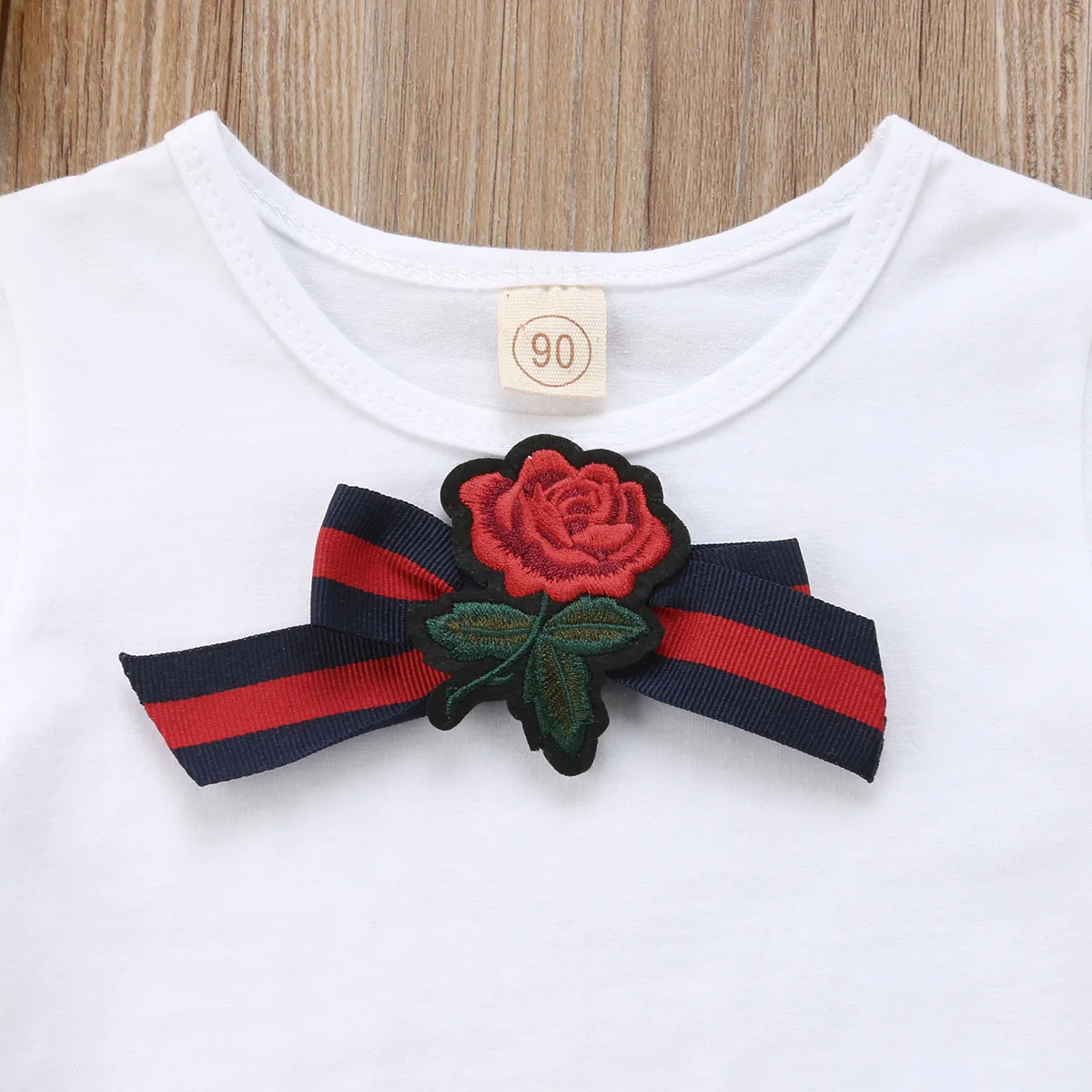 От 1 до 5 лет модная Дети для маленьких девочек лук цветок галстук футболка Топы+ юбка 2 шт. наряды комплект детской одежды