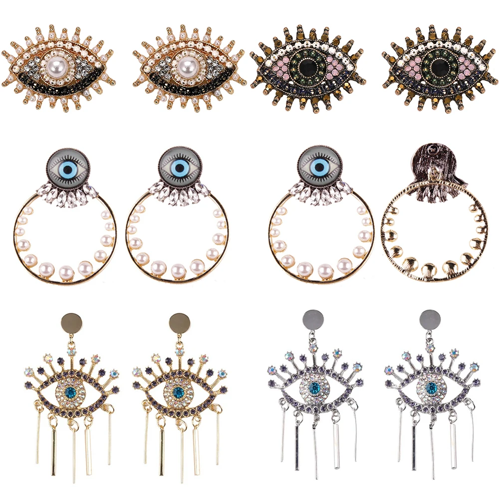 

Girlgo New 2019 Luxury Pearl Blue Eye Earrings For Women Charm Crystal Eye Dangle Drop Earrings Maxi Statement Tassel Jewelry