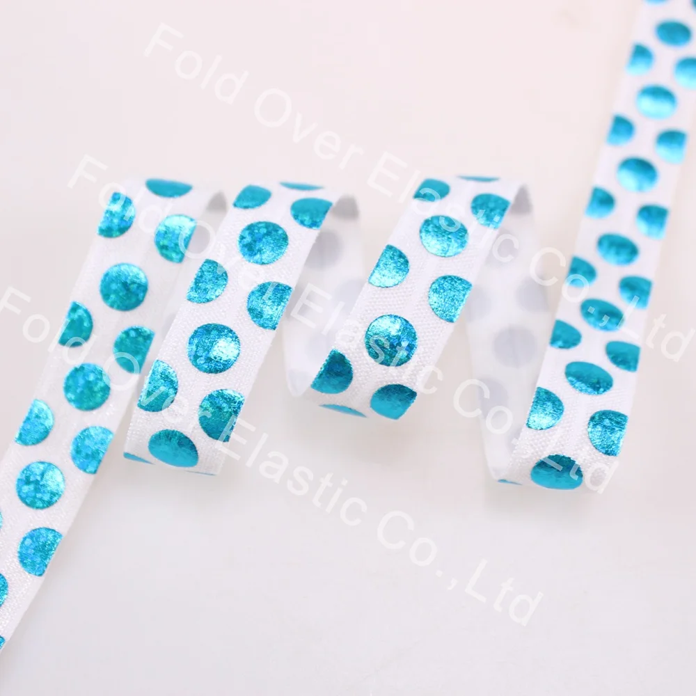 

Turquoise hologram foil polka dots 5/8" laser foil Fold over elastic ribbon 50 Yards per color