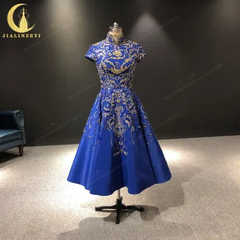 شراءJIALINZEYI Real Image فساتين سهرة فاخرة بأكمام قصيرة لون أزرق ملكي وخرز ذهبي بطول الكاحل فساتين رسمية 2019