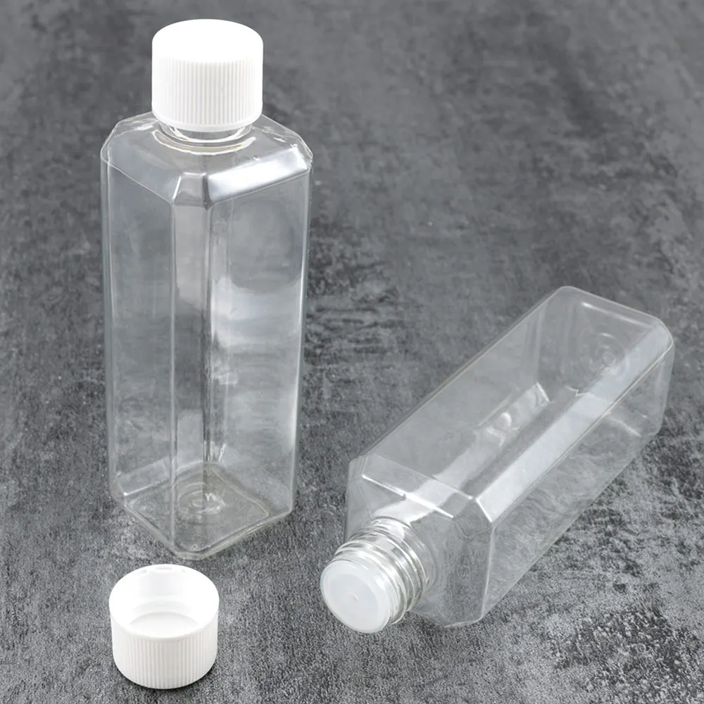 

2 pcs /set 100ml Clear Flip Top Cap Empty Packaging Containers Empty Lucency Plastic Pack Bottle Refillable Bottles