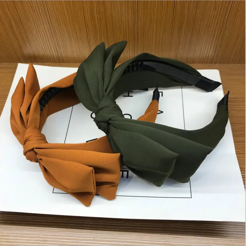 

Fashion hair accessories women's solid color middle big bow headbands sweet Wild headband with tooth pressure hair band headwear
