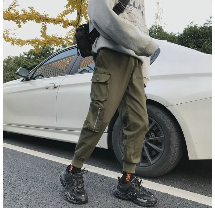 Модные мужские штаны-шаровары с карманами и эластичной резинкой на талии, повседневные черные брюки в стиле хип-хоп, мужские брюки-карго