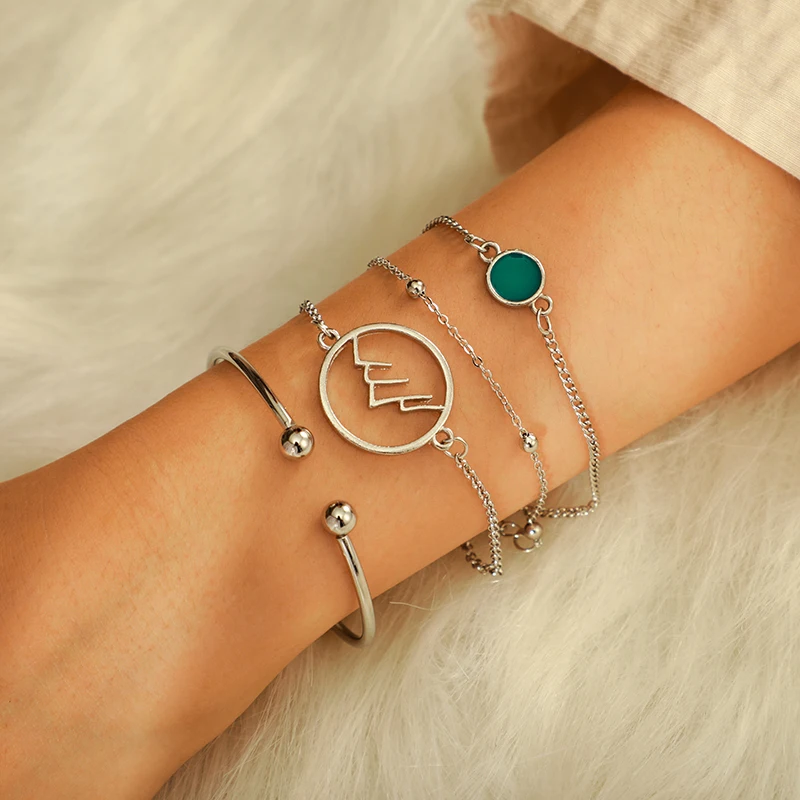 

HuaTang Bohemia Vintage Silver Green Stone Hollow Mountain Peak Shape Layered Bracelets Set for Women Adjustable Bangles 6988