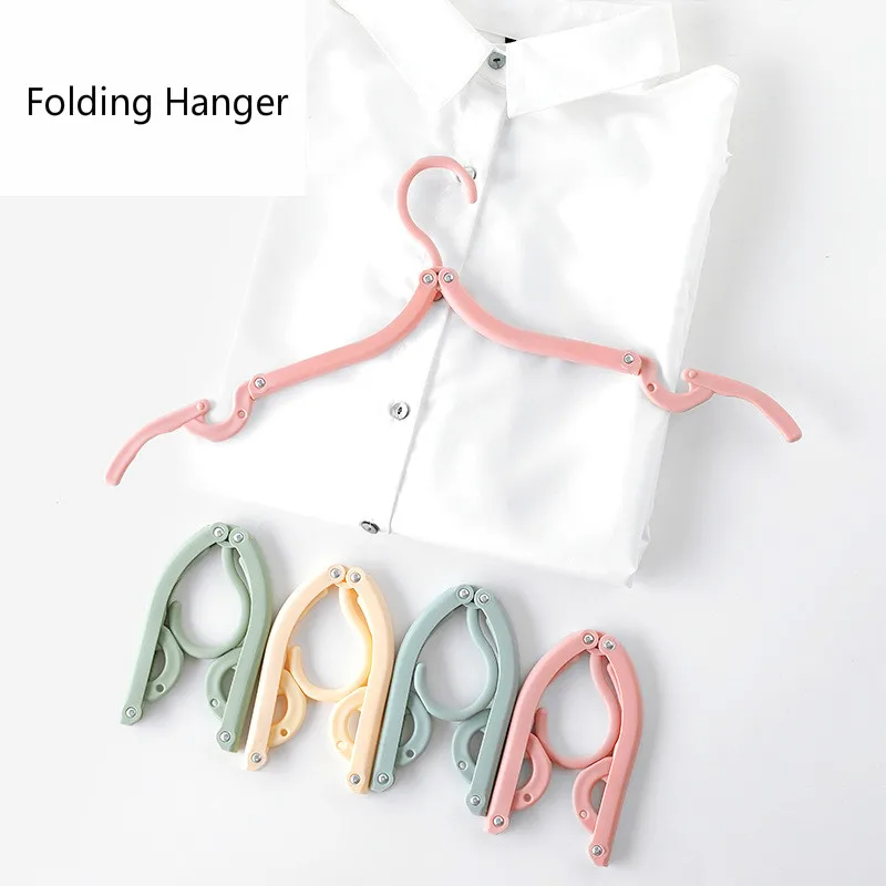 

4Pcs/Set Portable Folding Clothes Hangers Clothing Drying RacksTravel Dormitory Cloth Hanger Household Baby Plastic Storage Rack