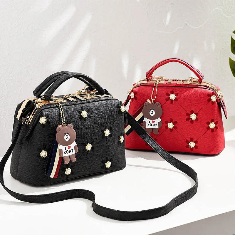 

2019 spring summer European and American fashion women's handbags Solid color Steel clip handbag new style lianhua 25X13X16cm