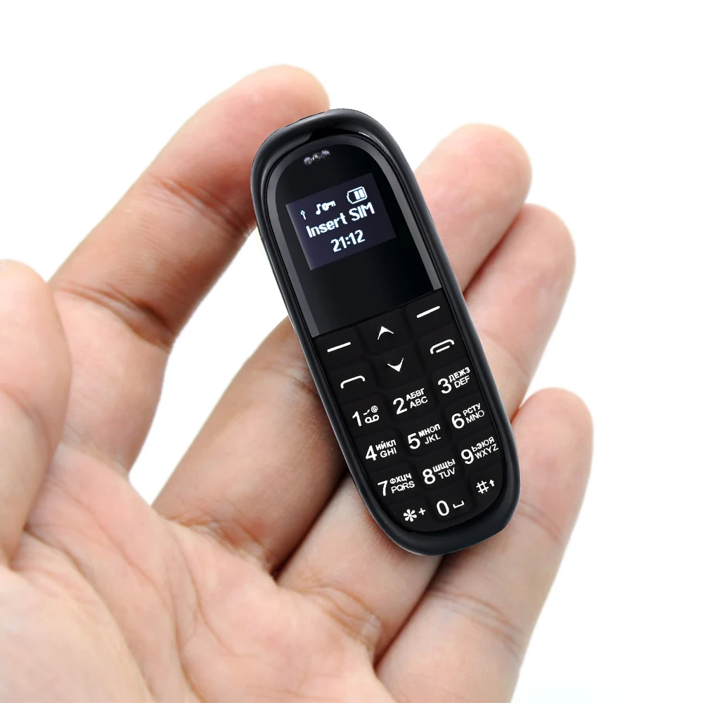 

KK1 Pocket Wireless Bluetooth Magic Voice Mobile Phone Headphone Dialer Smallest Cell Phone Magic Voice Russian Keyboard