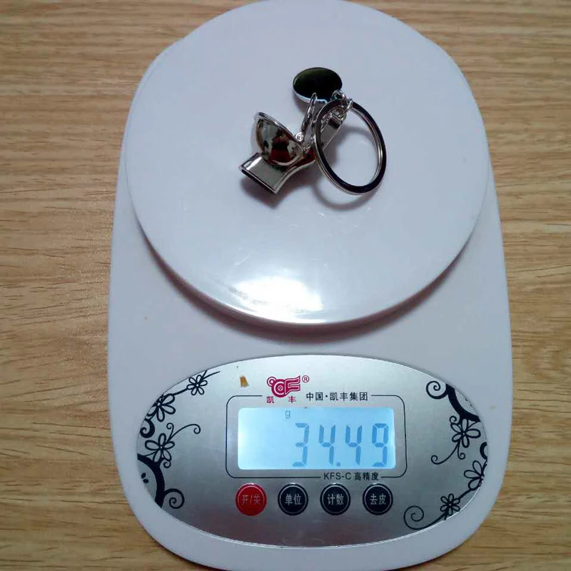 Ualgl moda metal Colgantes lindo divertido closestool estilo llavero para las mujeres bolso Accesorios car keyring llavero