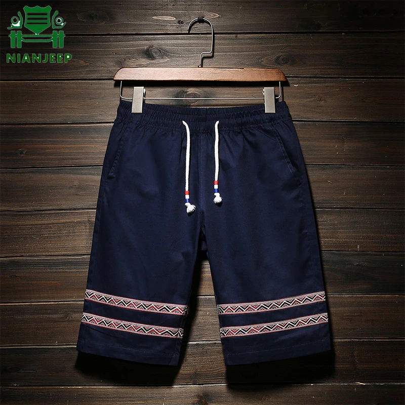 Бренд NIANJEEP мужские шорты дизайн мужские хлопковые свободные рабочие повседневные шорты плюс размер 4XL шорты Прямая