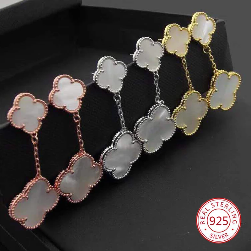 

S925 sterling silver earrings four-leaf clover female peacock green white fritillary Korean version simple Christmas gifts 2019