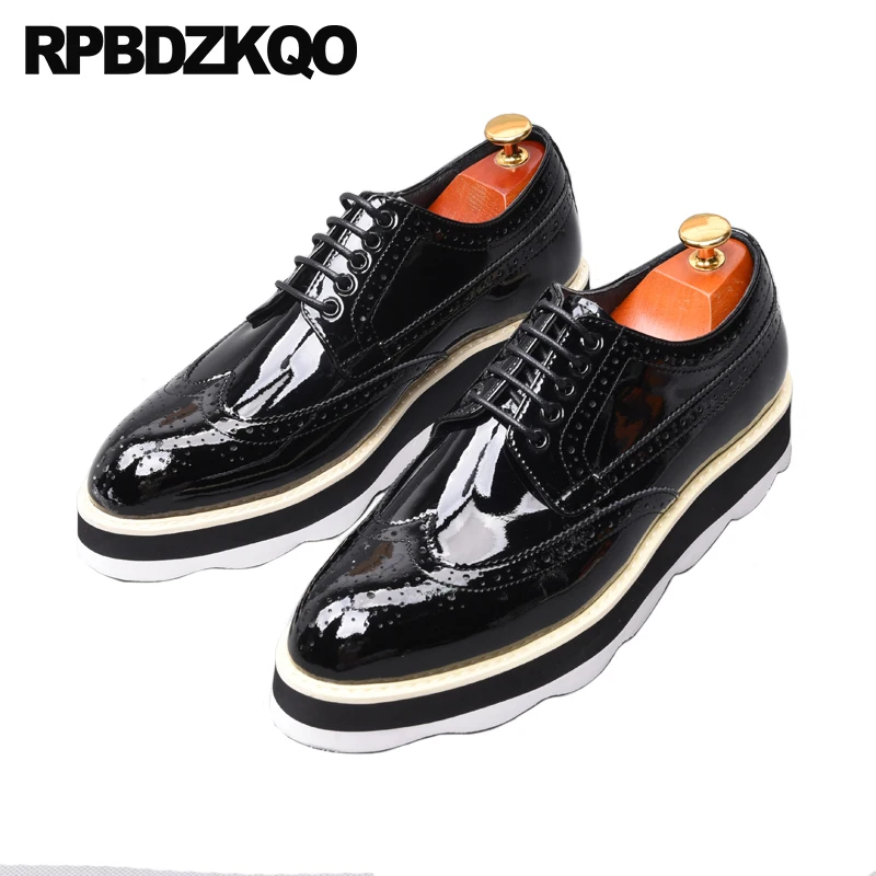 black patent leather wingtip shoes