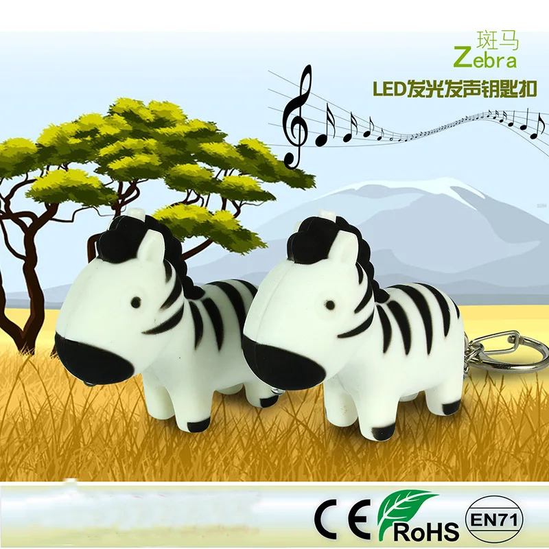 

FREE SHIPPING BY DHL 200pcs/lot 2015 Plastic LED Zebra Shaped Keychains with Sound Novelty Children Toy Keyrings