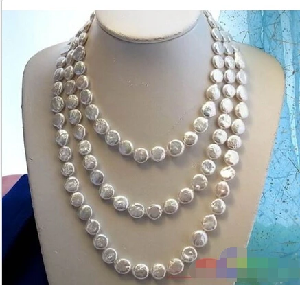 

A 64" 14MM WHITE COIN FRESHWATER CULTURED PEARL NECKLACE