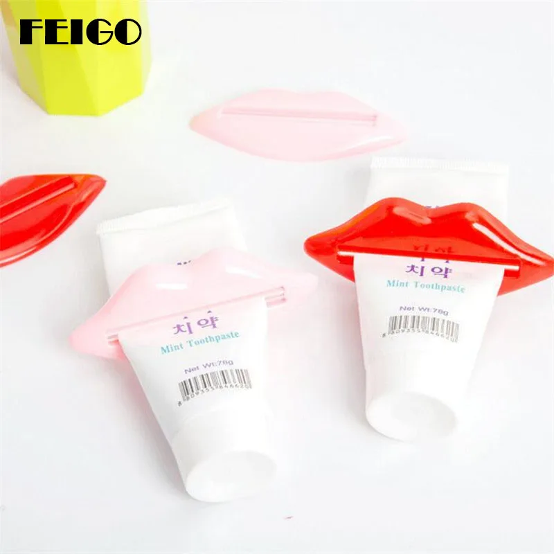 FEIGO 2 Pcs Red Lip multifunction squeezer toothpaste squeezer Home Tube Rolling Holder Squeezer Easy Toothpaste Dispenser F106