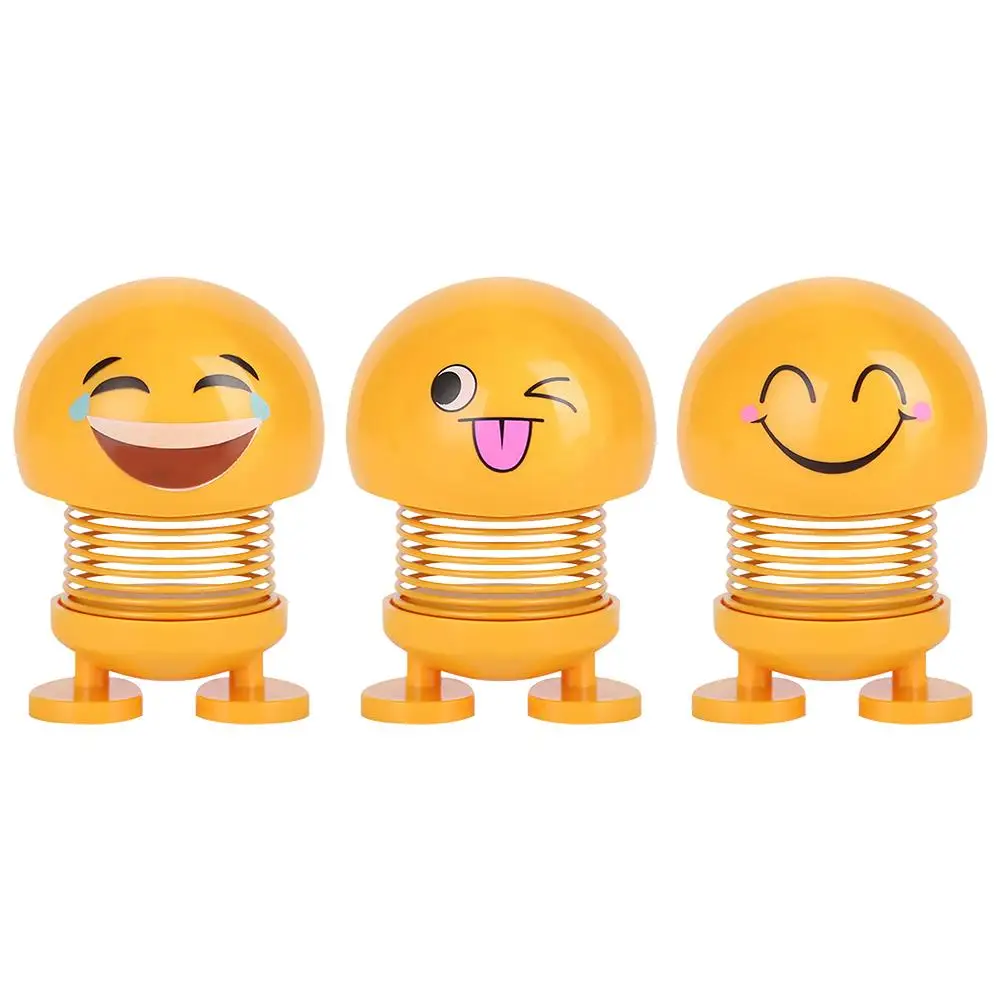 smiley face spring doll