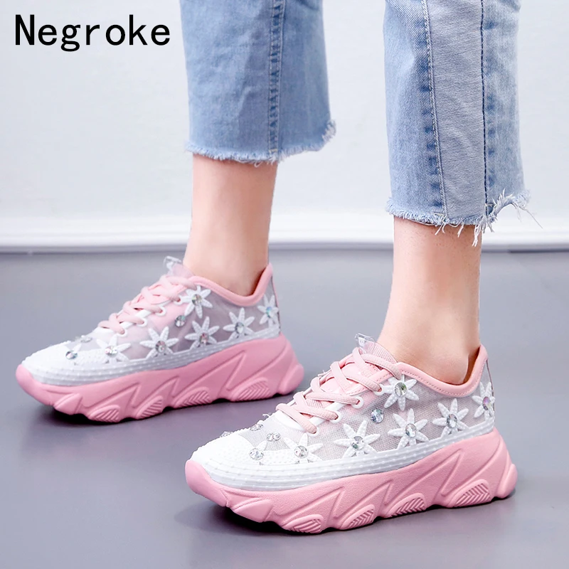 pink and white designer sneakers