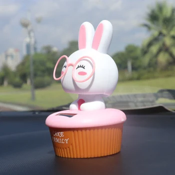 

Car Ornament Shaking Head Cute Glasses Rabbit Cake Automobiles Decoration Solar Power Cartoon Toys Auto Dashboard Accessories