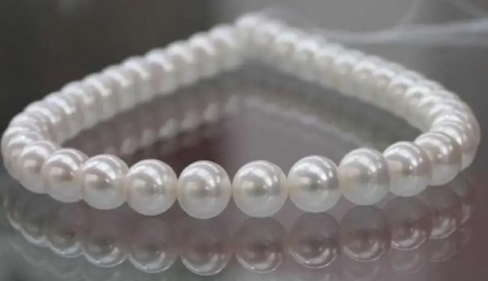 

Beautiful south sea Cultured AAA+ 6.5mm-7mmwhite pearl necklace 18"14K Gilded