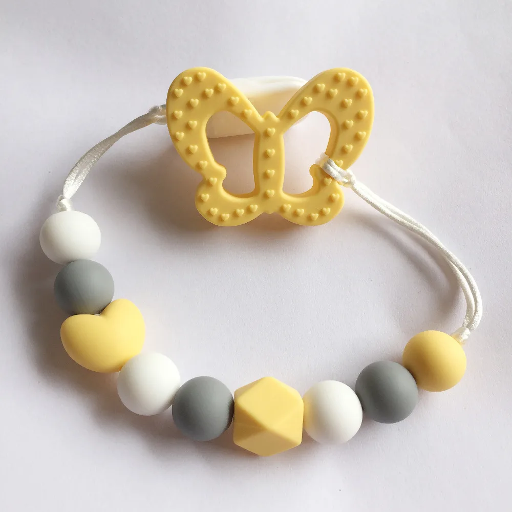 Прорезыватель бабочка из силикона для прорезывания зубов соска зажим