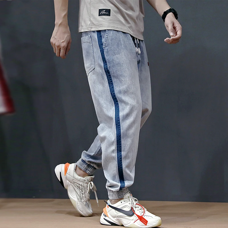 Fashion Streetwear Men Jeans Loose Fit Side Stripe Designer Harem Pants Slack Bottom Elastic Waist Hip Hop Joggers Jeans Men Fashion Streetwear Men Jeans Loose Fit Side Stripe Designer Harem Pants Slack Bottom Elastic Waist Hip Hop Joggers Jeans Men
