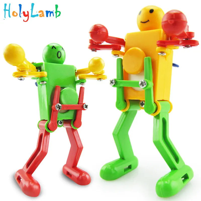 1Pcs Random Color Novelty Dancing Robot Gift Kids Children Baby Clockwork Classic Educational Toys Develop Intelligence Gift 1Pcs Random Color Novelty Dancing Robot Gift Kids Children Baby Clockwork Classic Educational Toys Develop Intelligence Gift