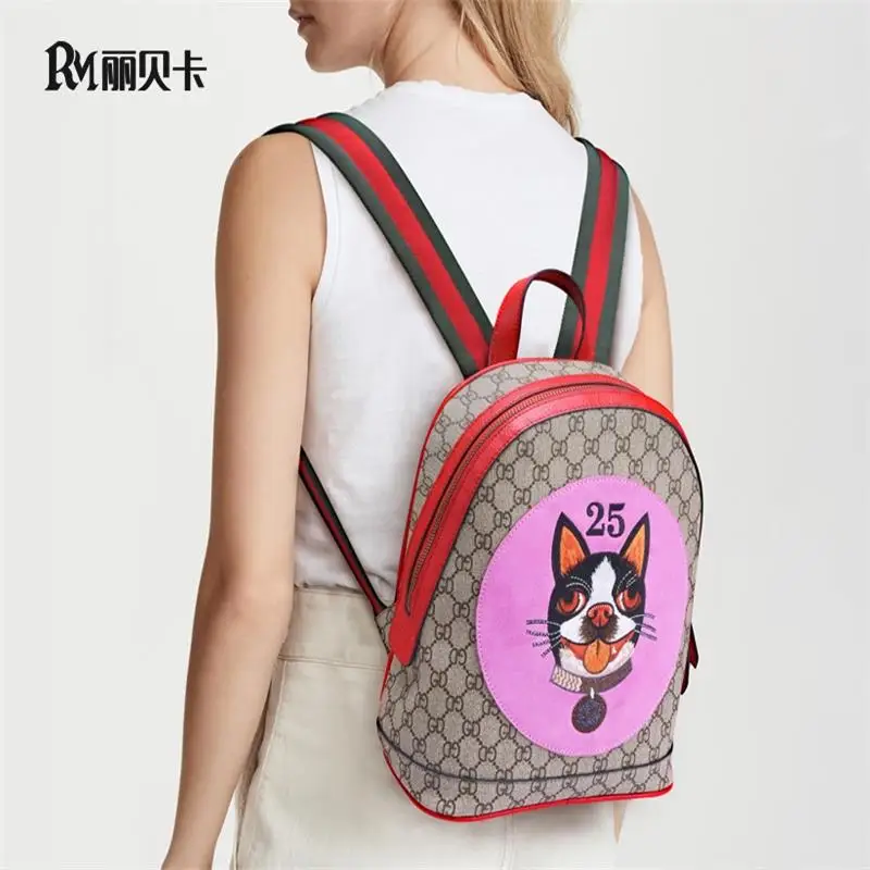 

Leather shoulder bag 2019 fashion backpack new top layer cowhide women's backpack European Il Divo backpack Dog cartoon bag