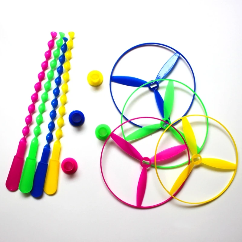 

New Package of 12 Twisty Flying Saucers Assorted Colors Helicopters Kids Toys Gifts