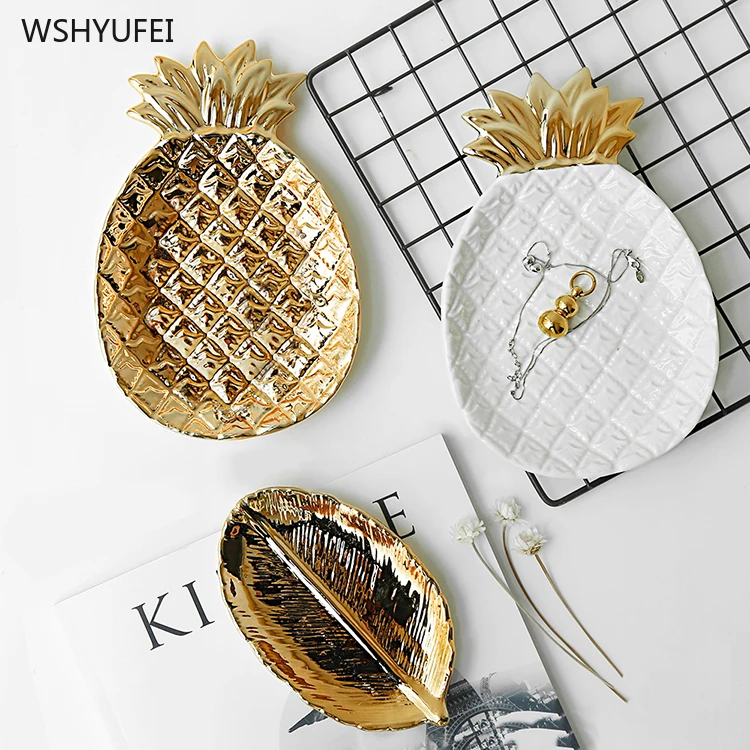 

Direct sales Nordic luxury plating ceramic golden pineapple styling jewelry plate breakfast fruit plate decoration posing