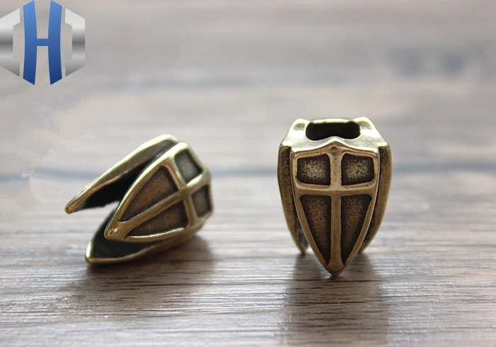 

EDC Brass Three-sided Shield Paracord Beads Knife Beads Blade Hanging Buckle Phone Pendant EDC Multi Tools Umbrella Rope Pendant