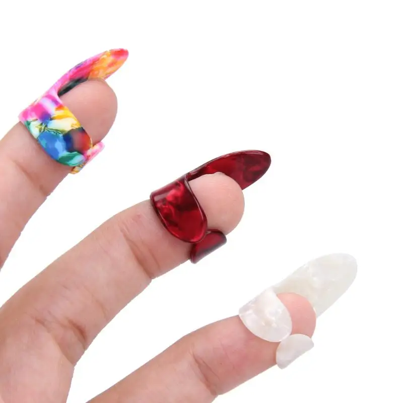 Ногти медиаторы для гитары. Медиатор коготь на большой палец. Медиатор на палец для гитары. Медиатор коготь для гитары. Медиатор на большой палец.