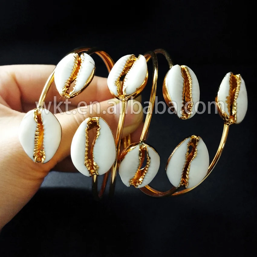 

Wholesale Fashion design tiny cowrie shell bangles 24k gold electroplated adjustable raw cowrie bracelet bangle