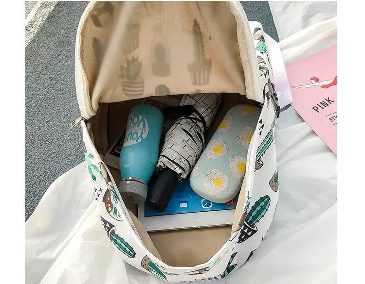 Rdywbu Graffiti lindo gato Cactus de impresión Mochila adolescente de gran capacidad bolso de escuela de niñas Casual bolsa de viaje Mochila B234 Rdywbu Graffiti lindo gato Cactus de impresión Mochila adolescente de gran capacidad bolso de escuela de niñas Casual bolsa de viaje Mochila B234