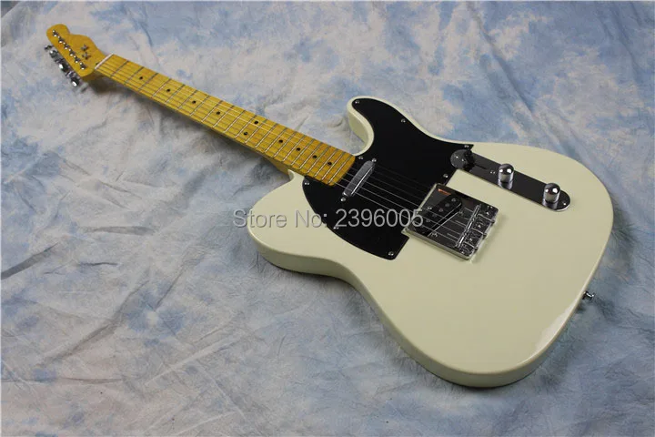

Hot sale cream white tele guitar.black pickgard.vintage bridge 53 version TL guitar.22 frets high quality free shipping