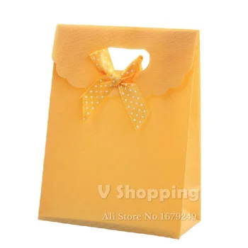 

16.5x12.5x6cm Strong PP plastic bag Bow flip Small gift packaging Hand bag The wedding Holiday Christmas Candy Bag box100pcs/lot