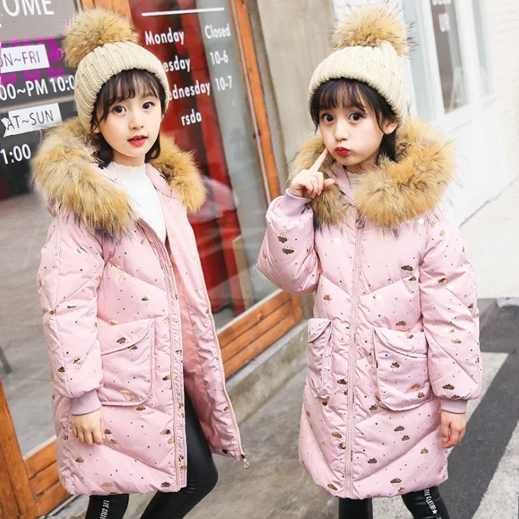

Tong down jacket 2018 new Korean version of the girl in the long section of the thickening of the big boy coa