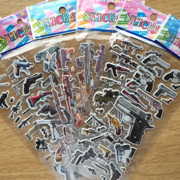 

HOT!1PCS world famous gun 3D stickers home wall decor cartoon mini sticker fridge notebook for kids toys GWOLVES