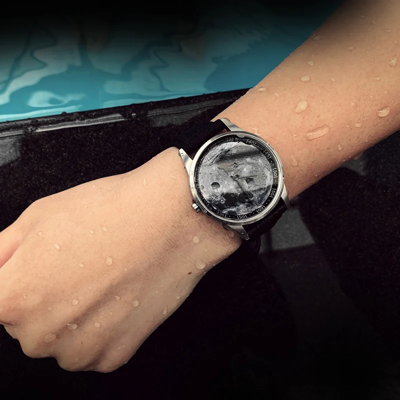 

Enmex design wristwatch Canvas strap waterproof creative design stainless steel case 3D moon outline face quartz sport watch