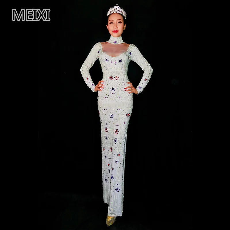 White slender figure with a low neckline color rhinestone with a high slit skirt bar party singer/dancer outfit White slender figure with a low neckline color rhinestone with a high slit skirt bar party singer/dancer outfit