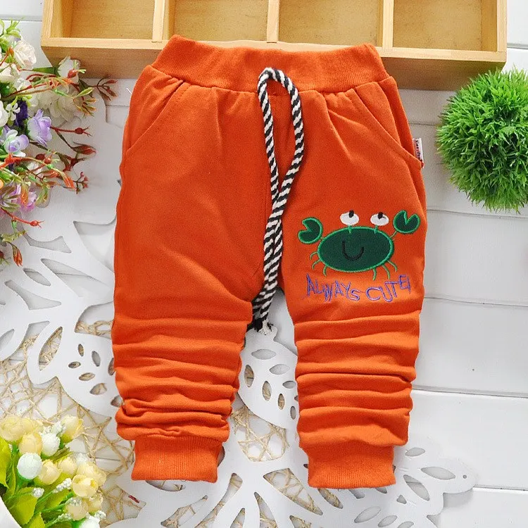 Г. Новая весенняя Корейская версия высококачественных хлопковых штанов с изображениями героев мультфильмов для маленьких мальчиков штаны для малышей от 0 до 2 лет штаны для маленьких девочек - Цвет: Orange