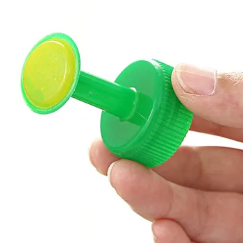 

Newly Plastic Home Pot Water Bottle Sprinkler Nozzle Plants Flower Garden Watering Tools