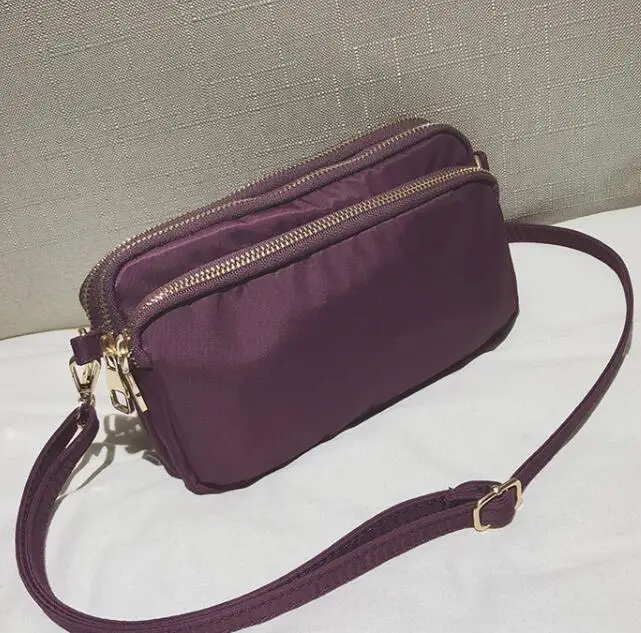 

2019 Korean version of the new trend of simple nylon cloth shoulder bag wild sports lightweight handbag casual messenger bag